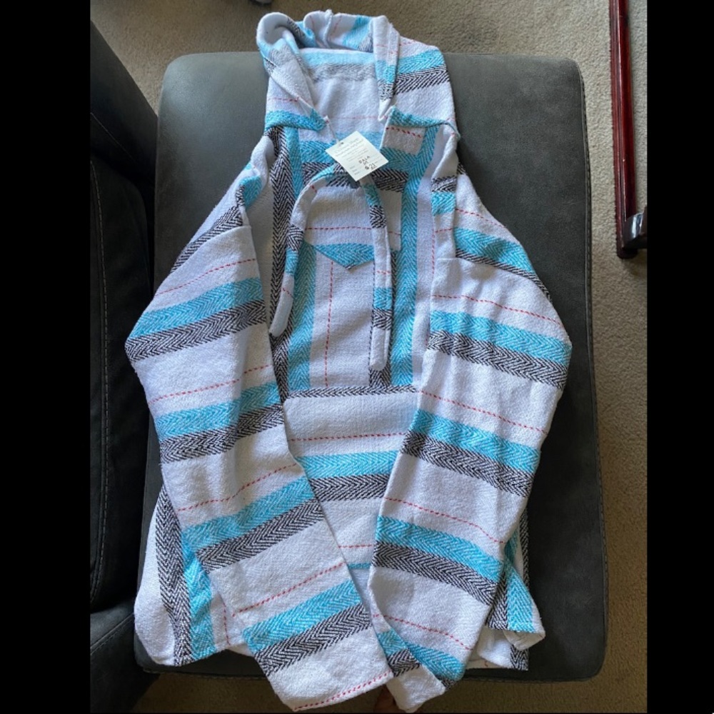 White, blue, grey & red stripped baja shrug/ poncho hoodie. NWT. Size M.